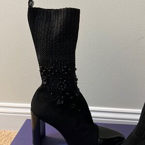 Stuart Weitzman sock boots with flower beads.